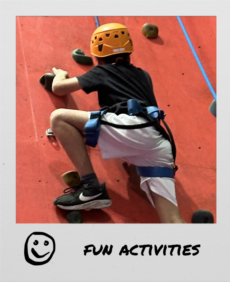 Polaroid image of a boy climbing a rock wall, titled “Fun Activities”