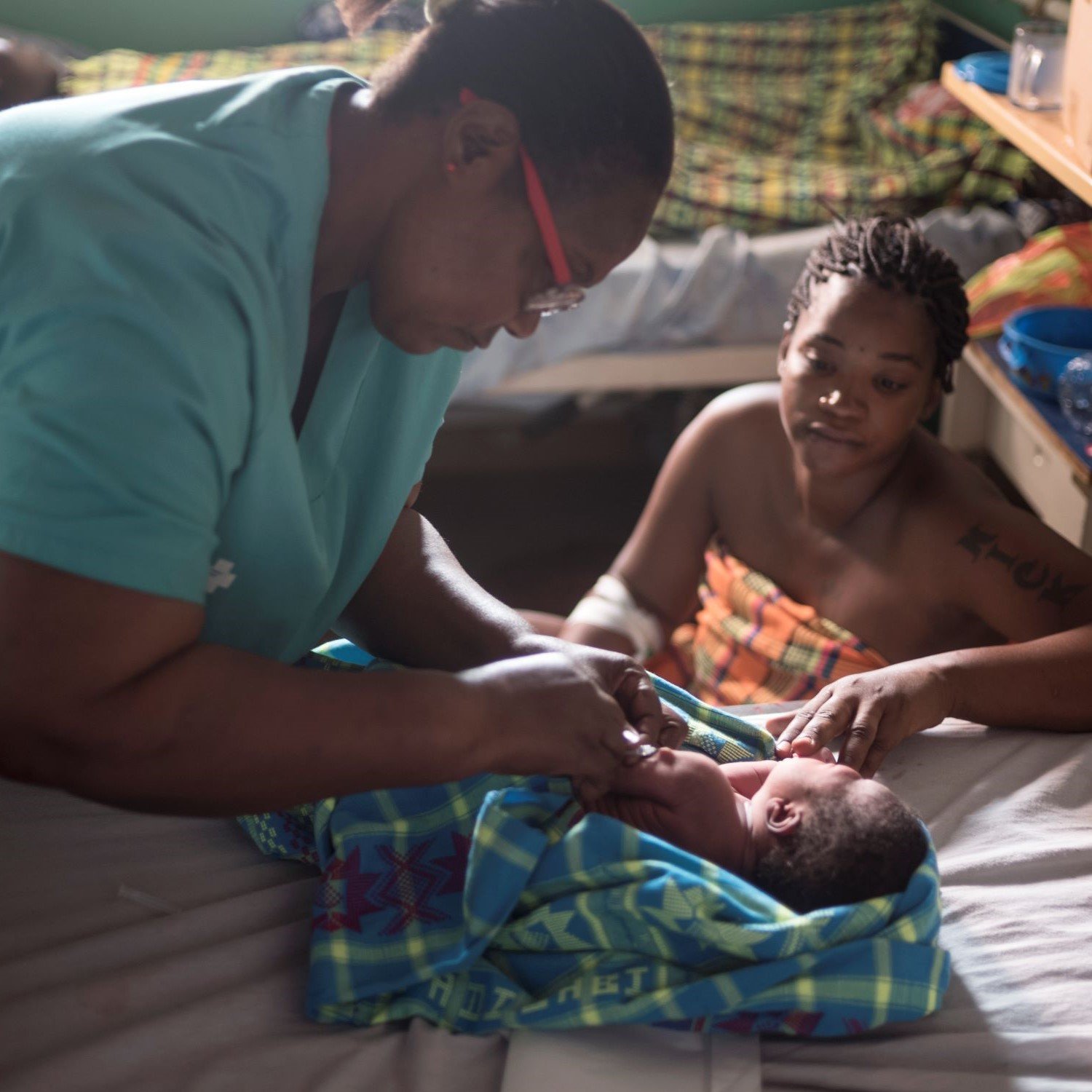 Baby in Guinea Bissau receiving vaccination